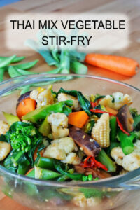 Finished Thai Vegetable Stir-Fry Pad Pak Ruam served with steamed jasmine rice