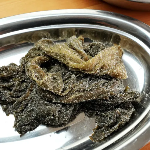 The preserved vegetables (mei cai) before washing