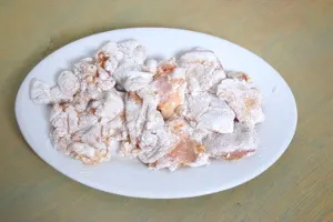 dredge chicken karaage in flour