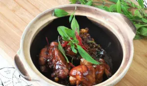 Three cups chicken (San Bei Ji) is so attractive because of its simplicity to prepare and concentrated flavor. Traditionally it is served bubbling hot in an earthenware pot with steamed rice or rice congee.
