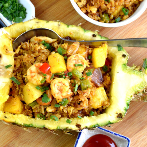 Pineapple fried rice is different from other fried rice because it is the only one cooked with fruits and curry powder. The sweetness of the diced pineapple provides a balance to the savory taste of shrimp and chicken.