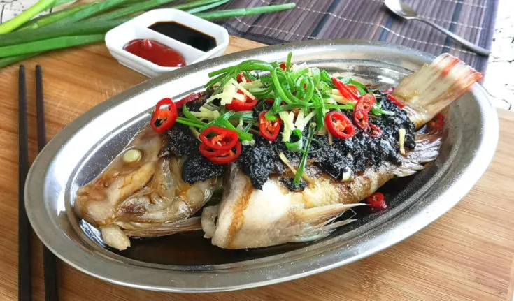 Steamed fish with black bean sauce 清蒸豆豉魚 is a traditional Chinese style cuisine popular among the Cantonese. This article explains all the right steps to prepare this dish in the traditional Cantonese way.