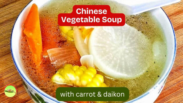 Chinese vegetable soup with daikon, carrot, sweet corn and onion in clear chicken broth