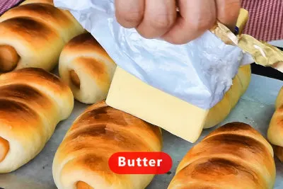 Sausage rolls - apply butter