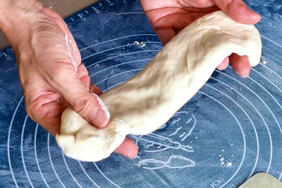 Shape the dough to become a long rectangle