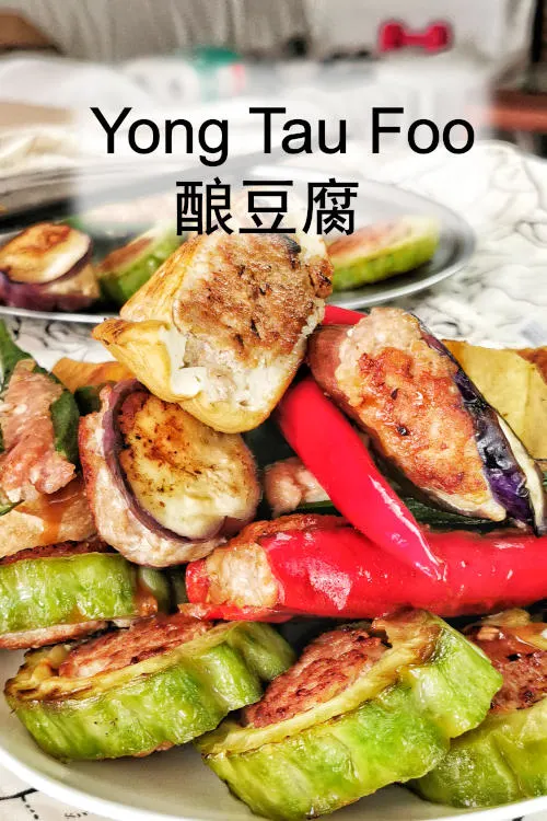 Yong Tau Foo is famous street food in Malaysia. Also, use red chilies, eggplants, and bitter gourds besides tofu to stuff the meat paste.
