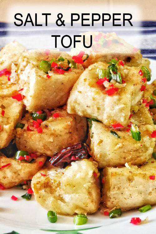 Salt and pepper tofu. It has a crispy exterior and a load of flavor from the savory seasoning. An authentic Chinese recipe.
