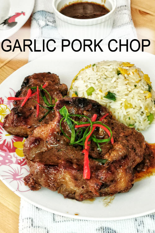 Tasty garlic pork chops with an Asian Twist. The pork is marinated with soy sauce, fish sauce, and black vinegar. Pair with fried rice for a complete meal.