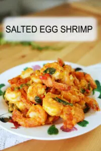 Salted egg shrimp with an incredible flavor. Deep-fried the shrimp twice to make it crispier and coated it with a salted egg butter sauce.