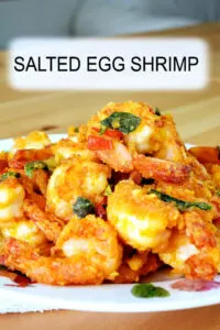 Salted egg shrimp with an incredible flavor. Deep-fried the shrimp twice to make it crispier and coated it with a salted egg butter sauce.