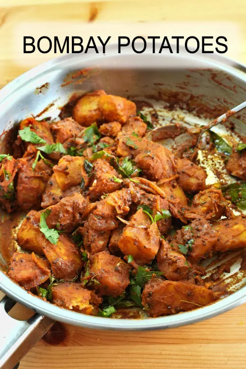 Try this easy Indian vegan Bombay potatoes (Bombay Aloo) recipe. Easy to make and packed with the flavor of aromatic spices.
