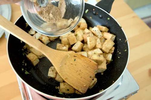 Combine the tofu with the salt and pepper mix.