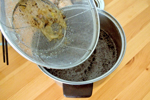 Pass through a strainer to get the clean broth