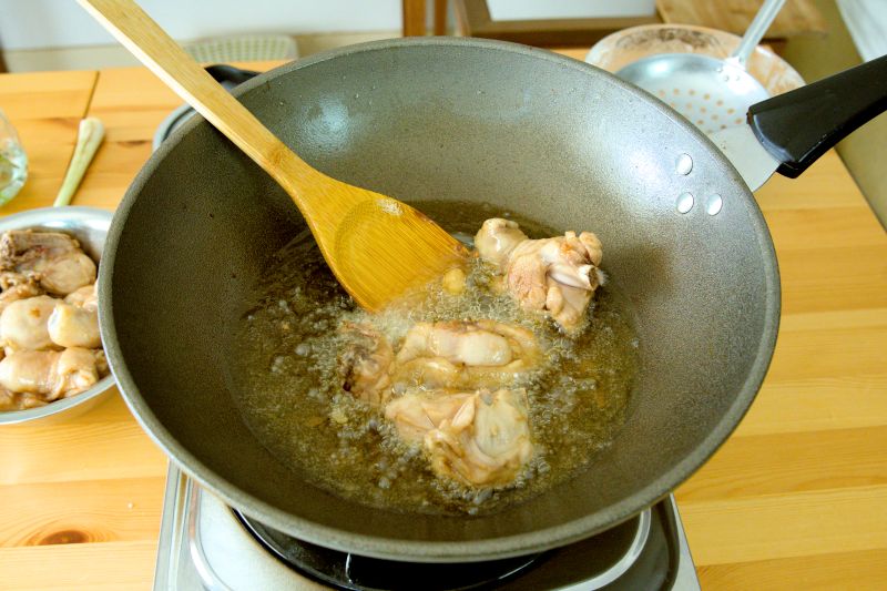 Deep fry the potatoes and chicken 