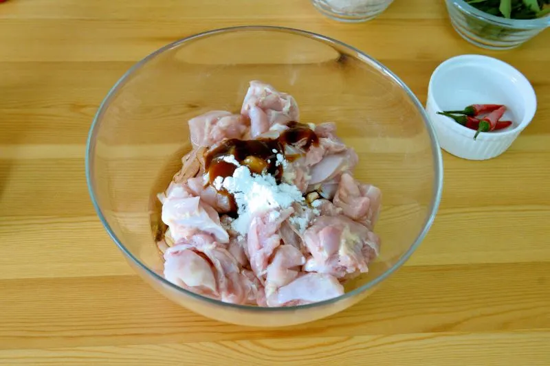 Marinate the chicken with light soy sauce to give it a better flavor