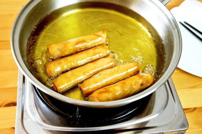 deep fried the spring rolls over medium heat until golden brown