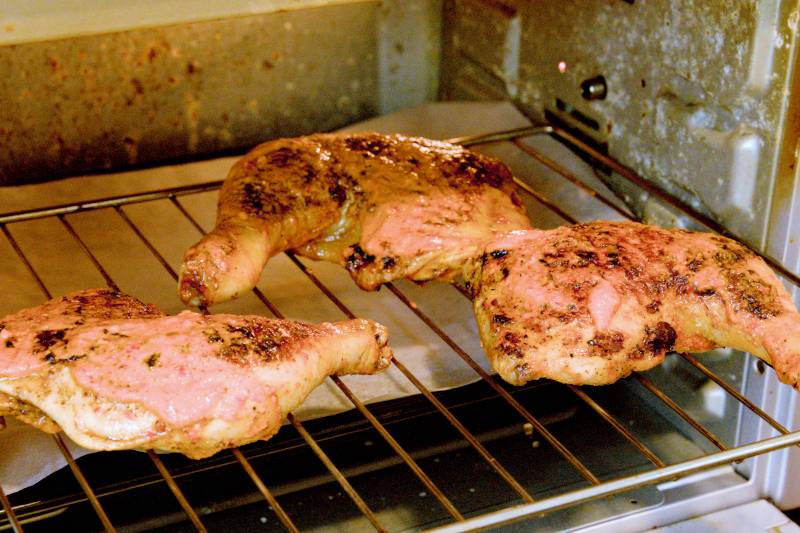 Place the chicken in the oven and roast at 150°C/300°F for about thirty minutes. 