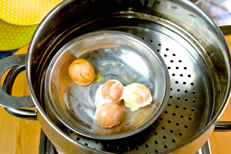 Place the yolks in a steamer with rolling boiled water for 5 to 7 minutes until cooked.