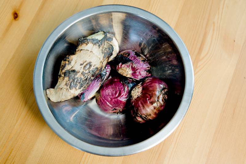 Charred onion and ginger are essential for giving pho its signature smoky flavor.