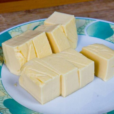 Homemade egg tofu cut into cubes and ready for cooking or serving