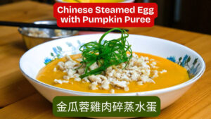 Chinese Steamed Egg with Pumpkin Puree and Minced Chicken topped with savory chicken and spring onions