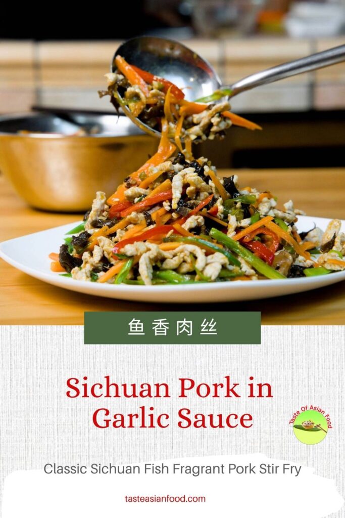 Yuxiang Rousi Sichuan pork stir fry served with steamed rice and colorful vegetables