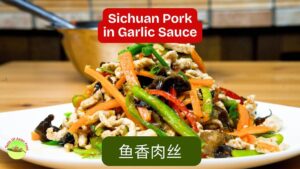 Sichuan pork in garlic sauce (fish fragrant pork) served with vegetables and a flavorful Sichuan stir fry sauce